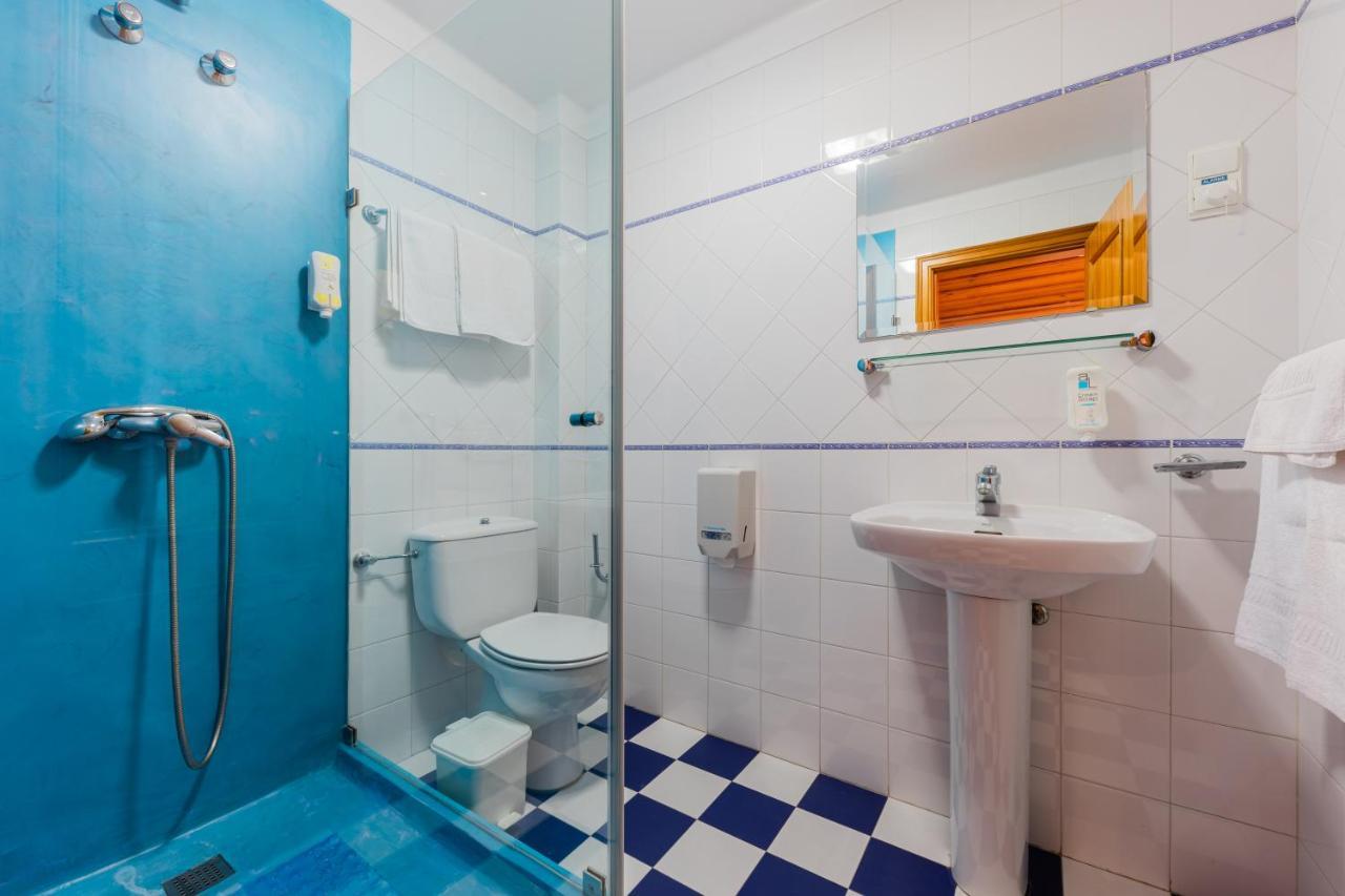 ホテル Patio Da Figueira トーレス・ヴェドラス 部屋 写真